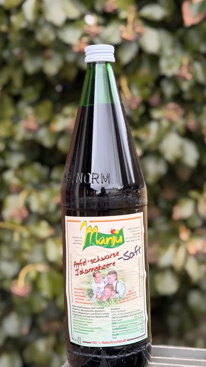Manju Apfel-schwarzer Johannisbeersaft in der 1-Liter-Flasche